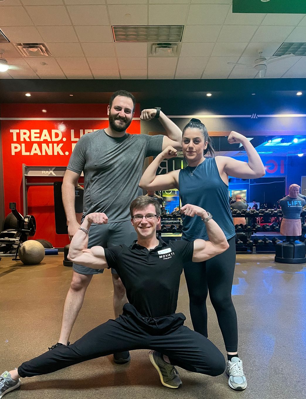 Matt Kennedy posing with personal
          training clients