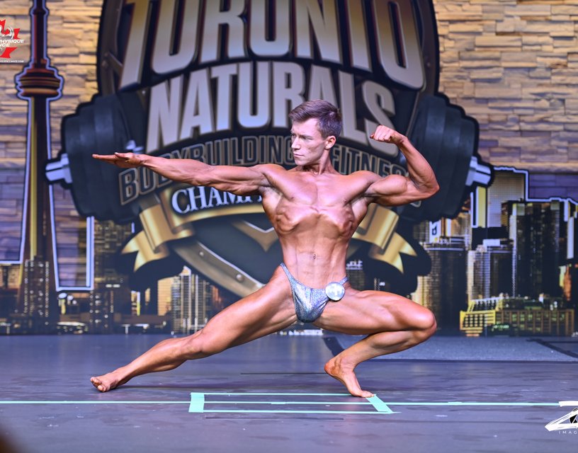 Matt Kennedy Posing on
bodybuilding stage